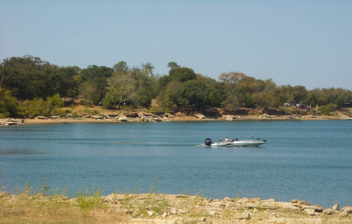 man on boat in lake Lewisville